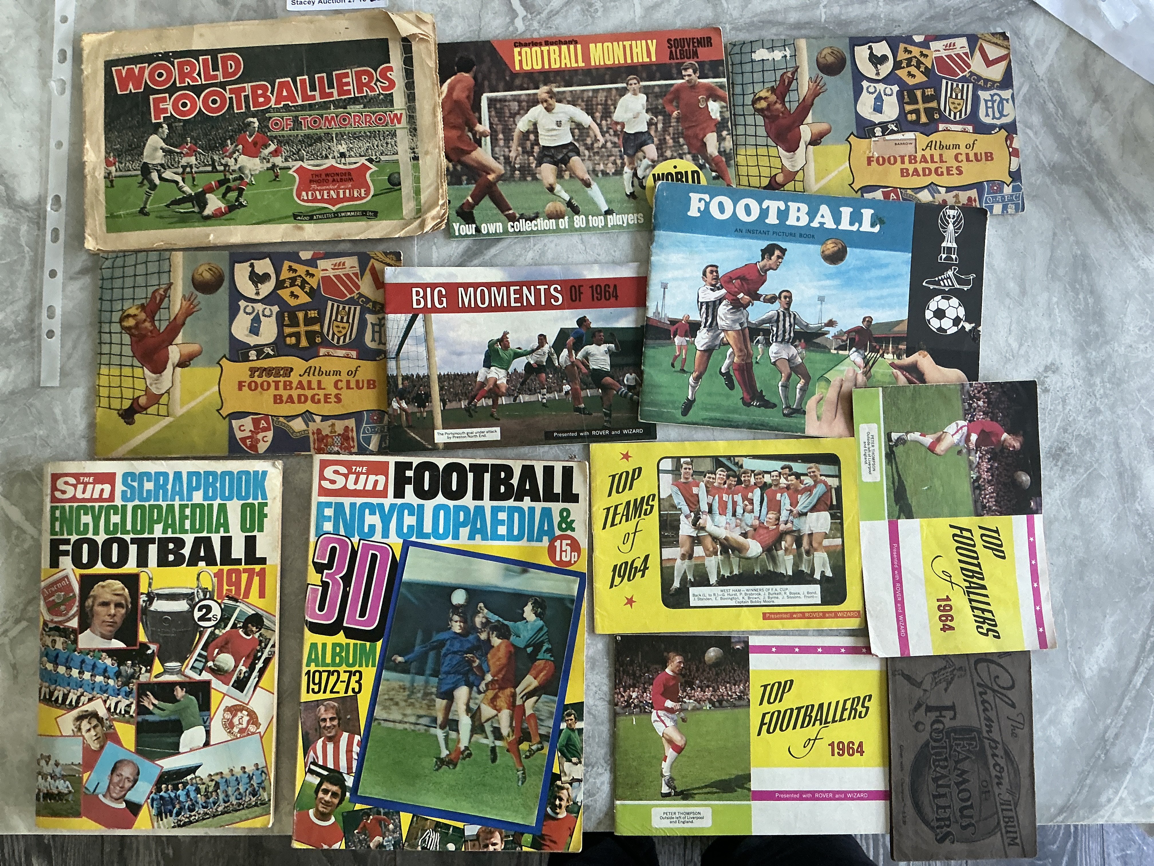 Football Card Albums: 1970 Patterson transfer book with unused transfers inside, 1964 Top Teams, Top Footballers x 2, Big Moments, Empty Charles Buchan World Stars, complete Tiger Club Badges, empty Sun 3D, complete 1930 Champions Album of Famous Footballers and more. Instructions to sell.