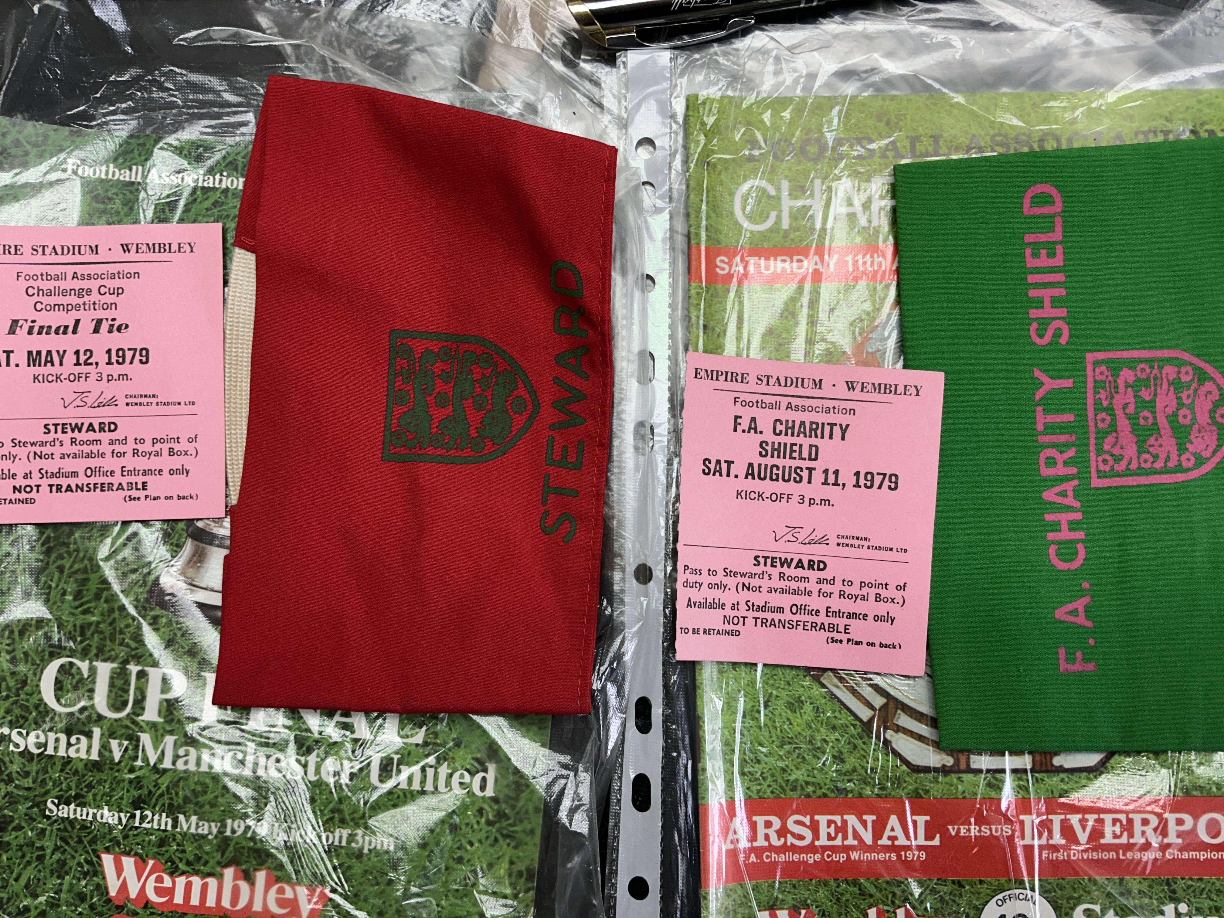 Steward Big Match Football Tickets: 1979 FA Cup Final programme stewards ticket and armband for Arsenal v Manchester United. Same for Charity Shield of same season Arsenal v Liverpool. England Stewards tickets v 1979 Wales, Bulgaria, Scotland, Denmark, 1980 Argentina, Eire, Norway x 2, 1981 Spain, 1982 W Germany, Netherlands, 1983 Greece, Wales, 1984 + 1986 Northern Ireland. All come with programmes.