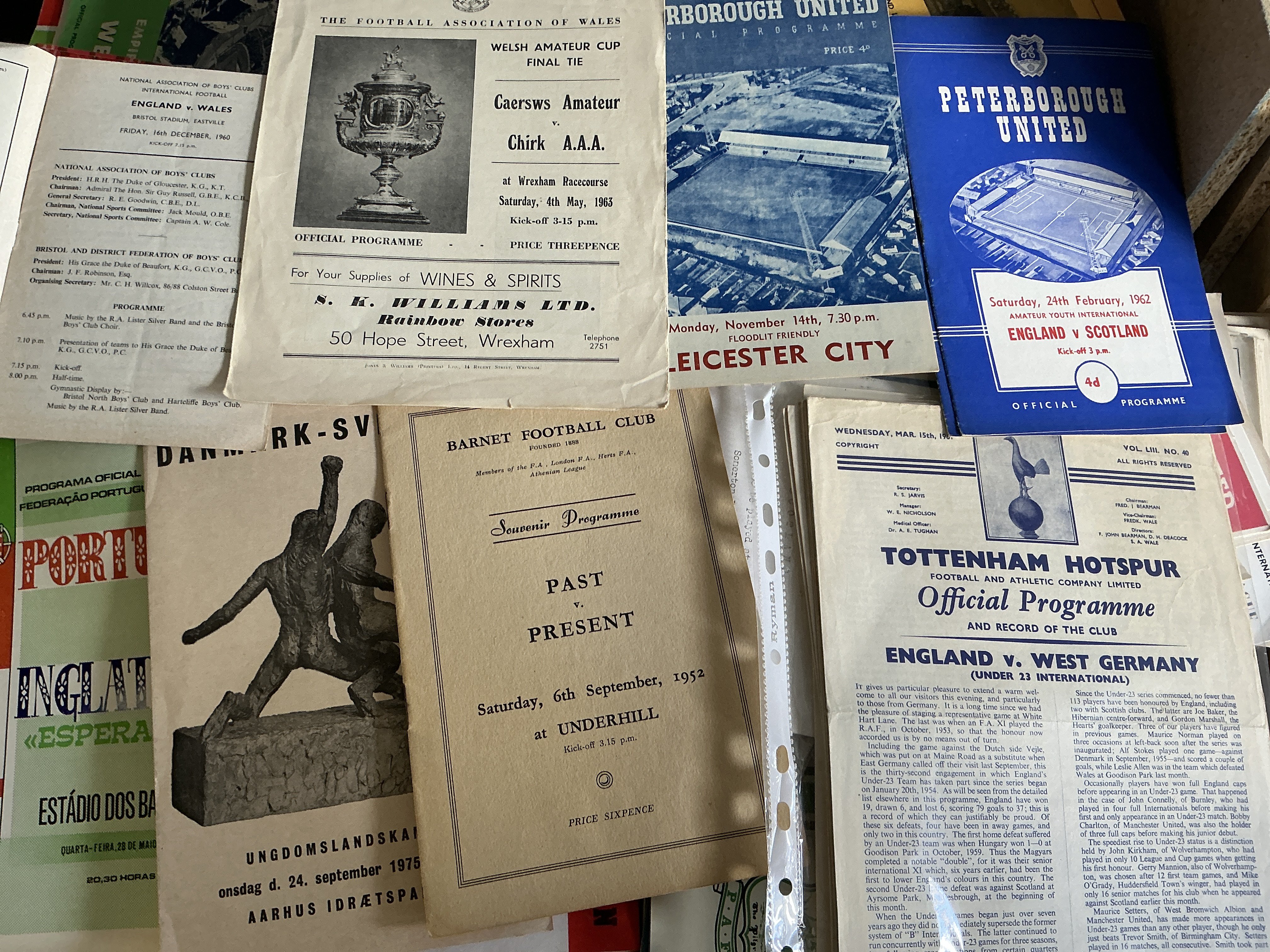 Big Match Football Programmes: Wide range mainly from the 60s with heavy duplication. There are some 50s and 70s. Includes 1952 Barnet Past v Present, 1955 Finland v Norway, Youth Tournaments, Welsh Amateur Cup, 1956 Australian Olympics Football, Testimonials, Internationals, 18 x 60/61 England v West Germany U23 at Tottenham, quantity of England v Young England, Benefits, Amateur Youth Internationals, U23s + Schoolboys. Definitely worth a look. Heavy duplication. (est 450)