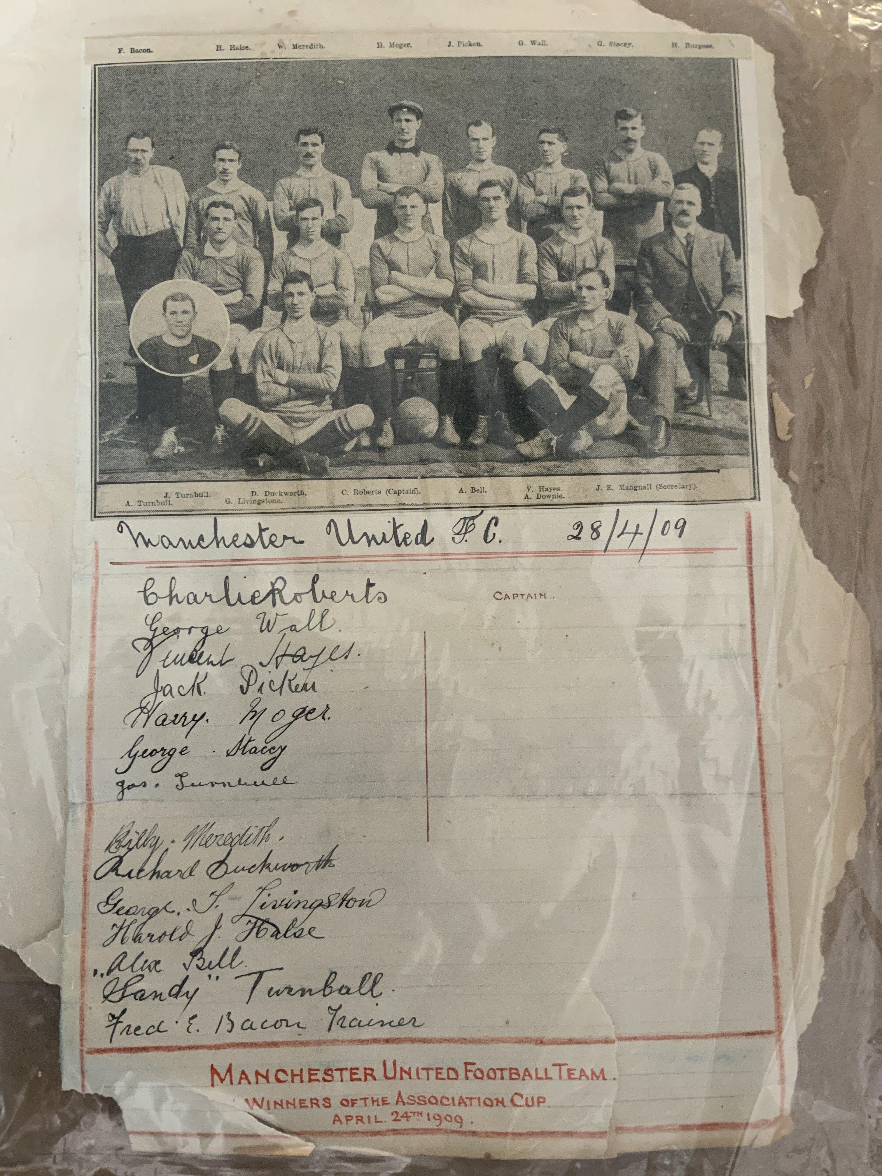 Manchester United 1909 FA Cup Winners Football Autographs: Newspaper team group of the cup winning team attached to a page with 14 autographs to include the trainer. The board its attached to is perishing but this does not affect the signatures and could be cropped. Rare item which sold for over 5500 pounds previously.