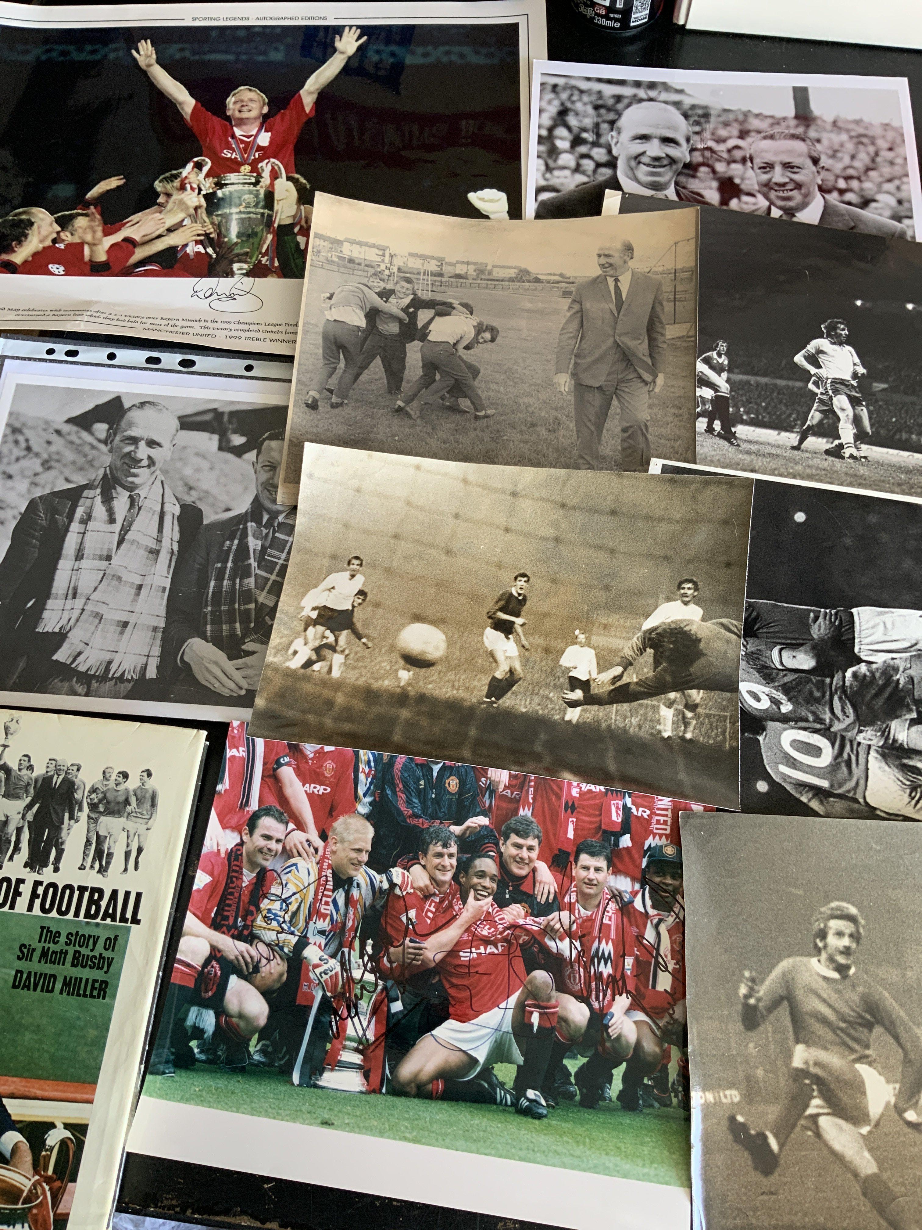 Manchester United Press Photos: Signed David May 1999 Treble photo and signed FA cup winners photo. Press photos featuring Law Stiles and others. Comes with a Matt Busby Father Of Football book. (11)