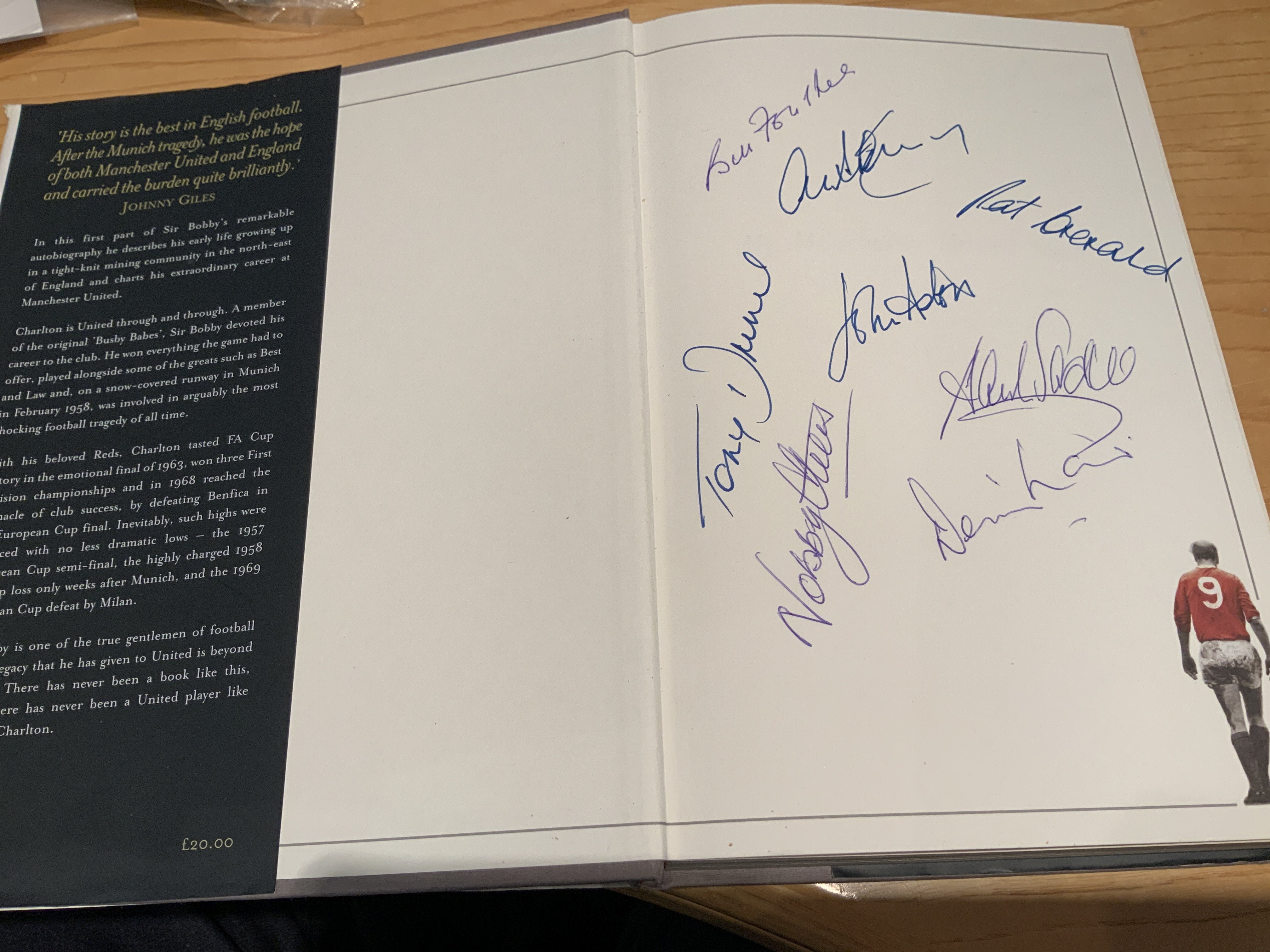 Bobby Charlton Multi Signed Manchester United Football Book: Sir Bobby Charlton Manchester United Years signed inside by himself. Also on first blank page it is signed by some of his Man Utd team mates to include Foulkes Crerand Stepney Aston Dunne Sadler Law and Stiles. All without dedication.