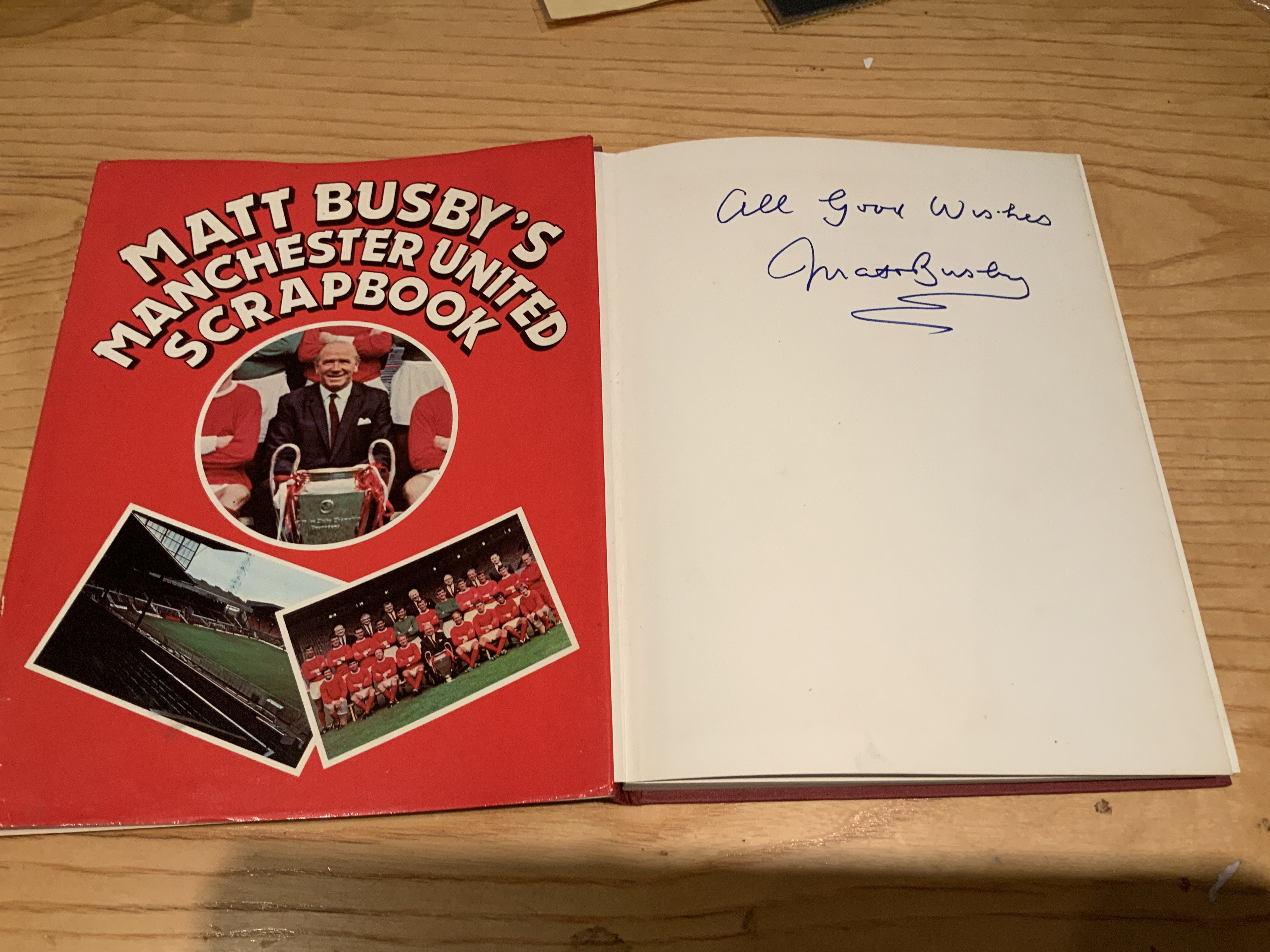 Matt Busby Manchester United Signed Football Book: Hardback book with dust jacket titled Matt Busbys Manchester United Scrapbook in excellent condition. Hand signed All Good Wishes without dedication.