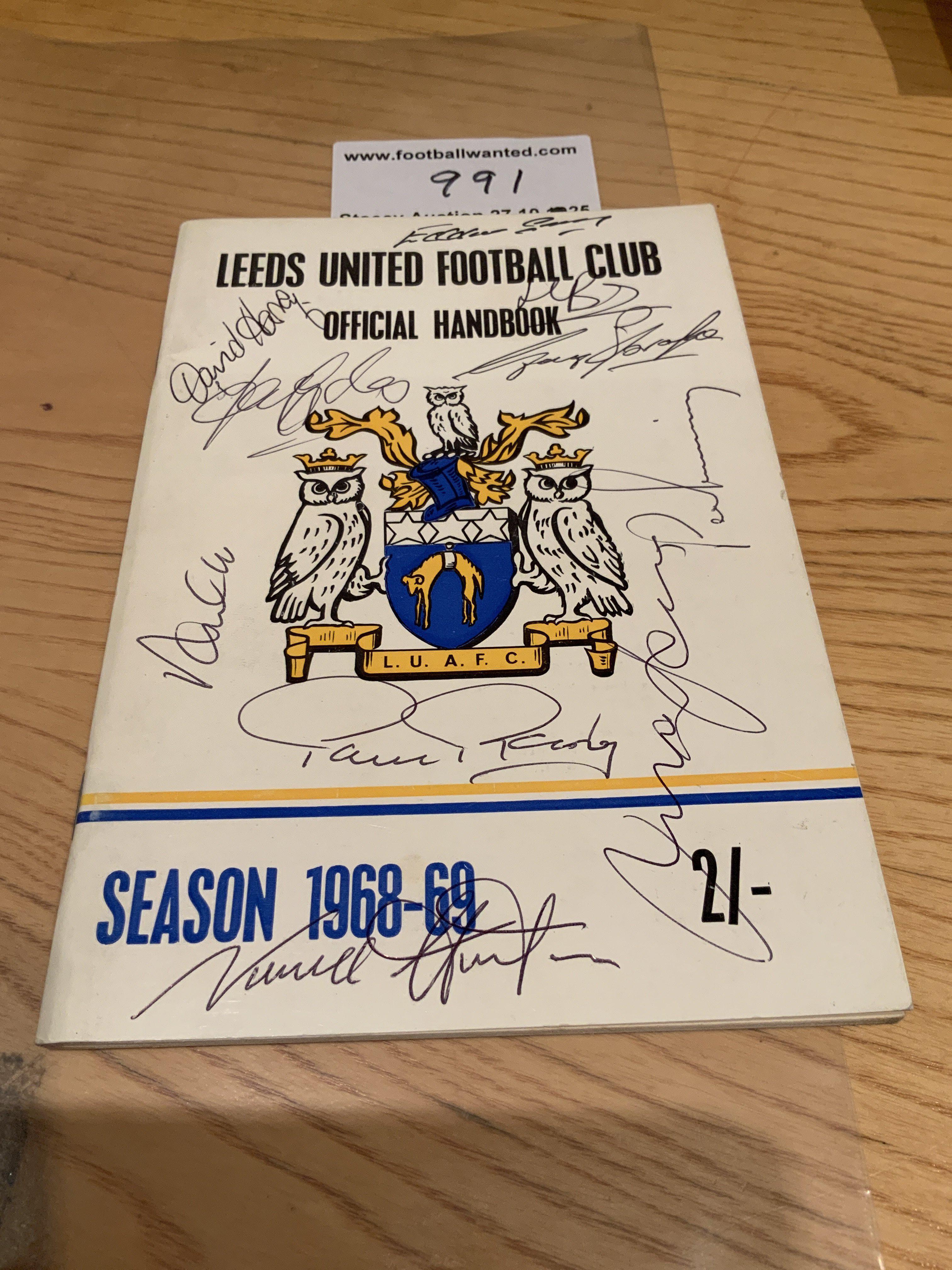 1968 - 1969 Leeds United Signed Football Handbook: COA from reputable source states it is signed to cover by Reaney Gray Hunter Jones Clarke Giles Yorath Bates Lorimer and Harvey.