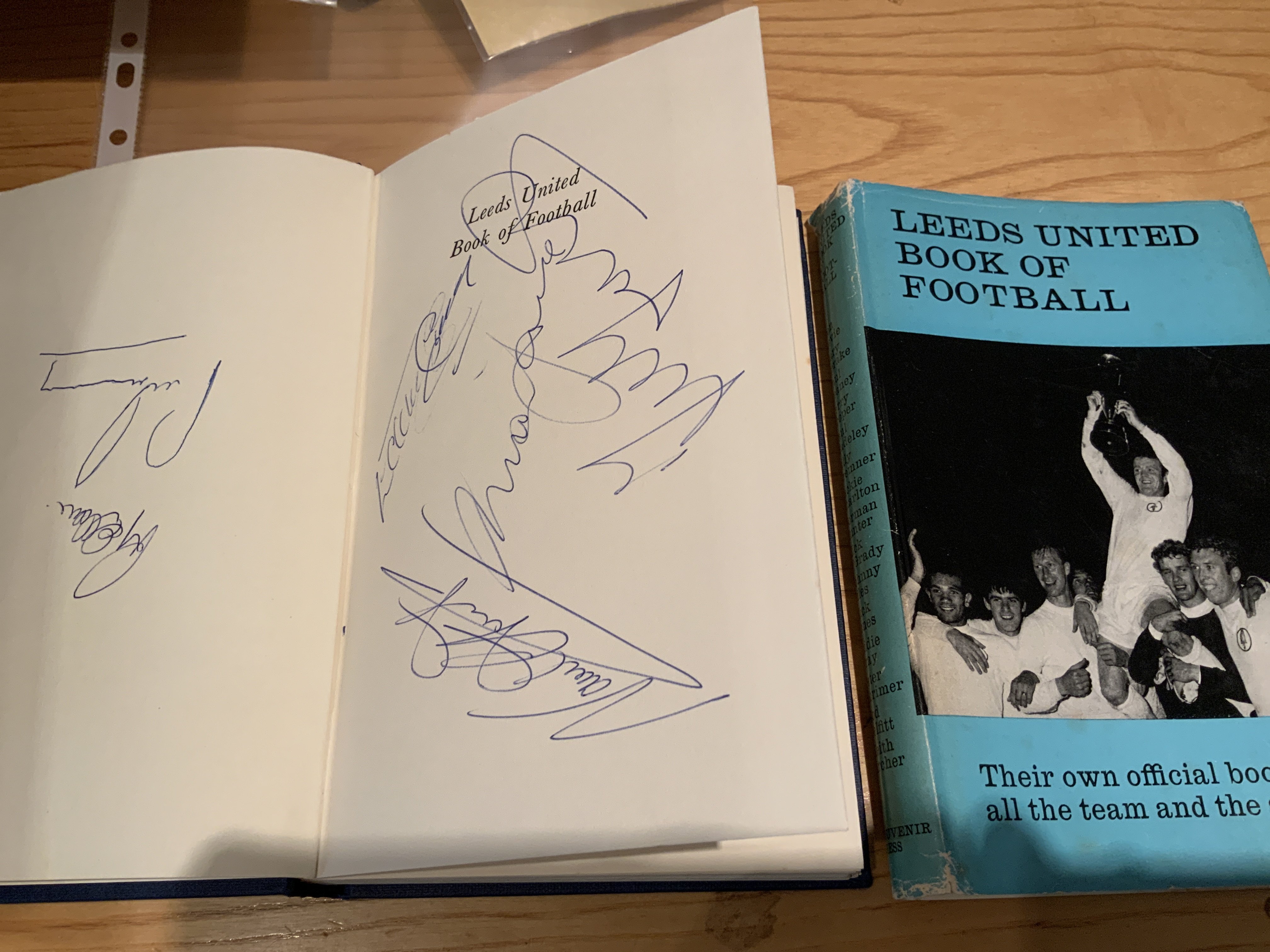 Leeds United Signed Book Of Football: Original 1969 hardback book with dust jacket hand signed by Hunter Gray Yorath Jones Lorimer and Ellam.