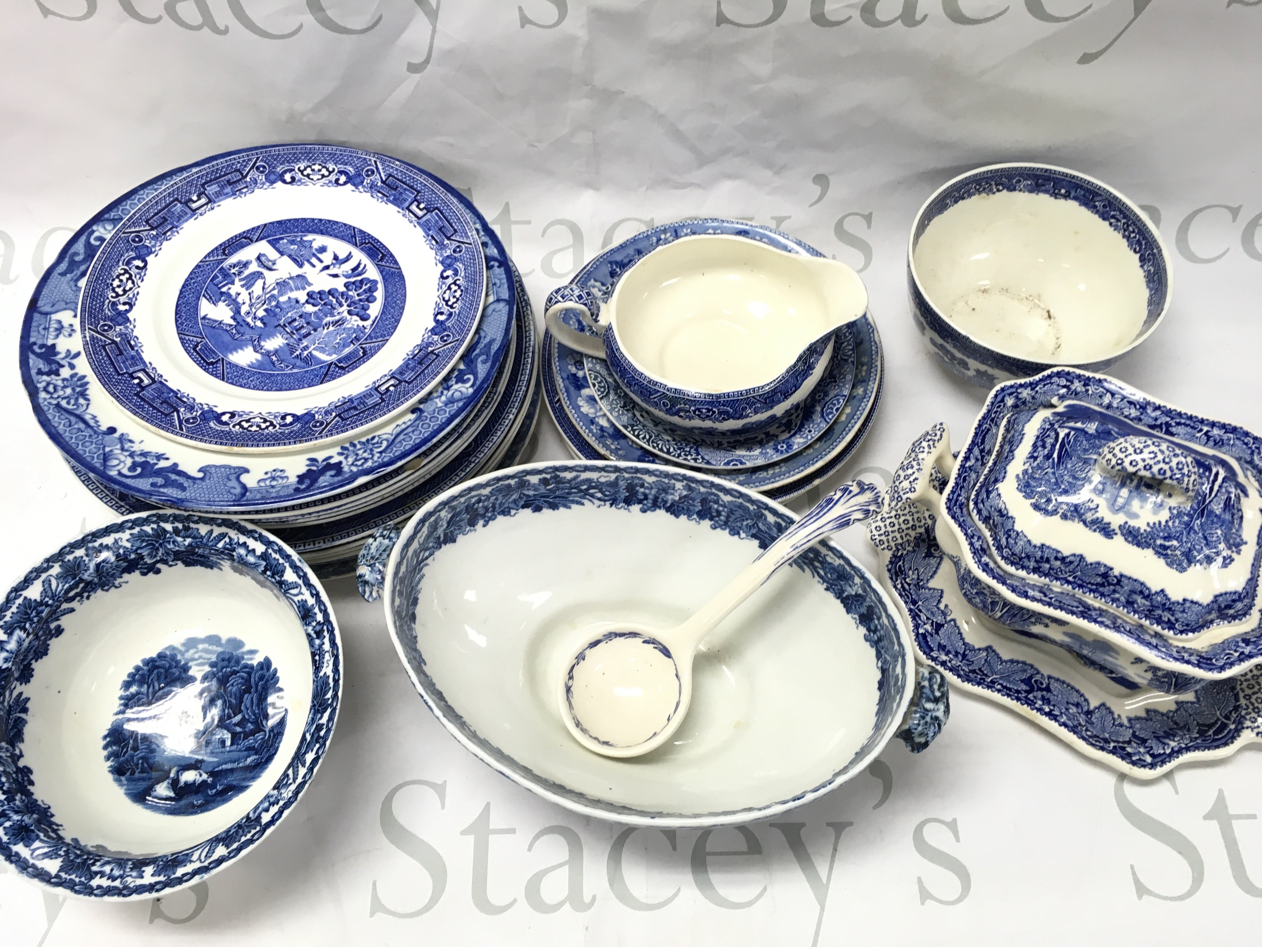 A Collection of blue and white ceramics including plates, bowls by Booths, Masons, Old Willow etc Coalport Kings ware canton dishes. This lot cannot be posted- NO RESERVE