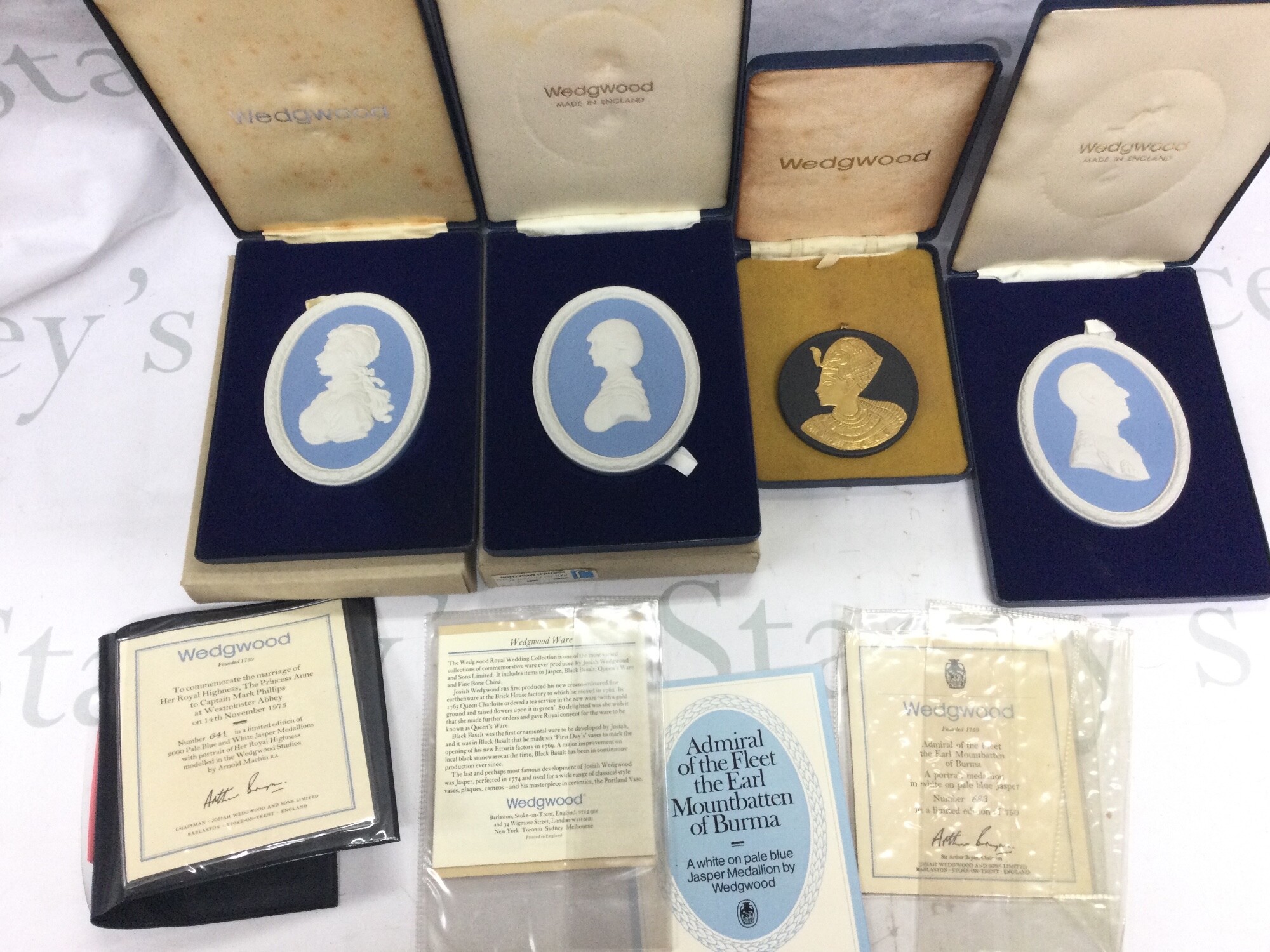 Four boxed Wedgwood plaques with certificates