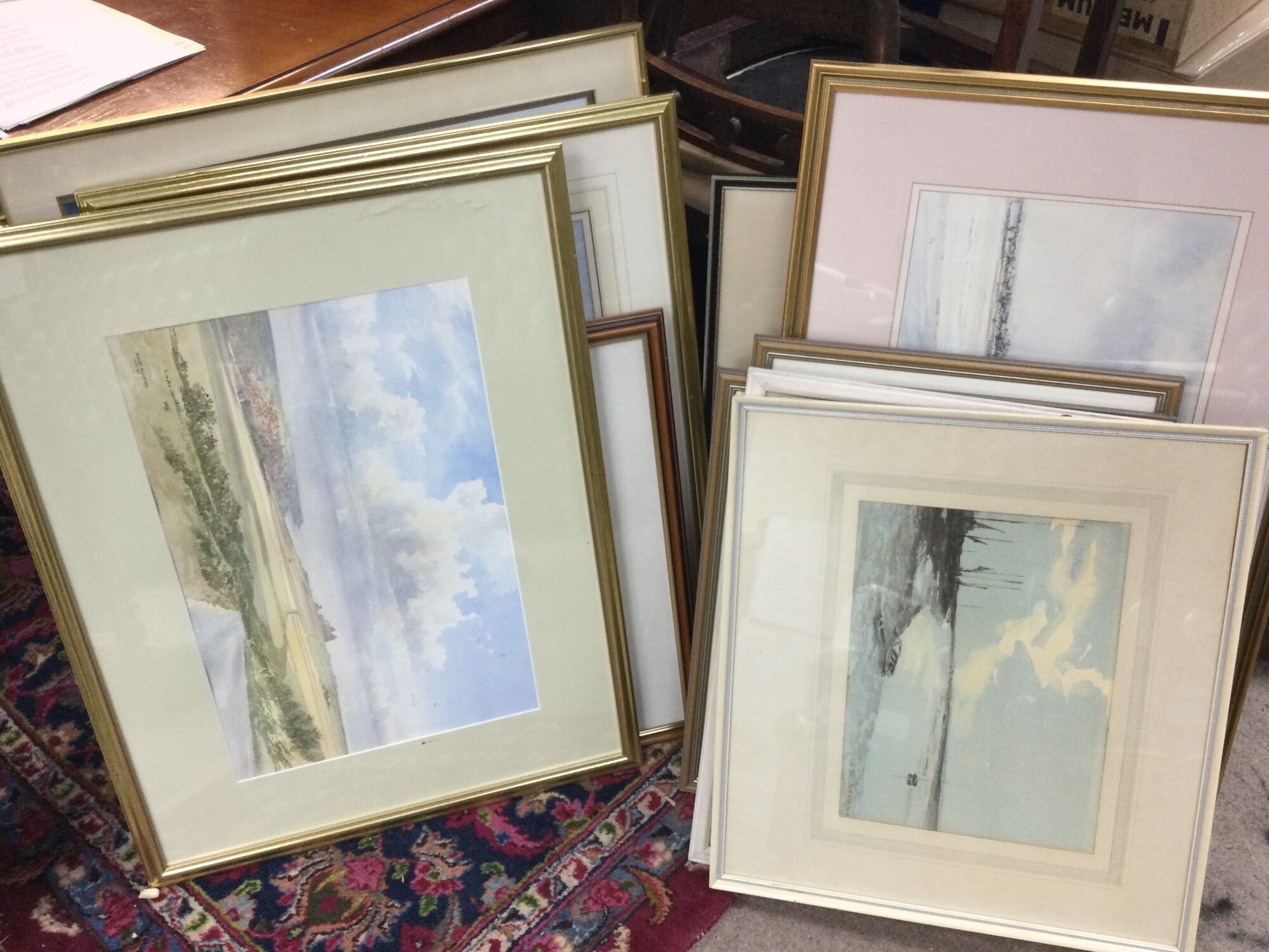 A large collection of framed watercolours by local artists and of local views including artists David Plested , Sybil Mullen Glover