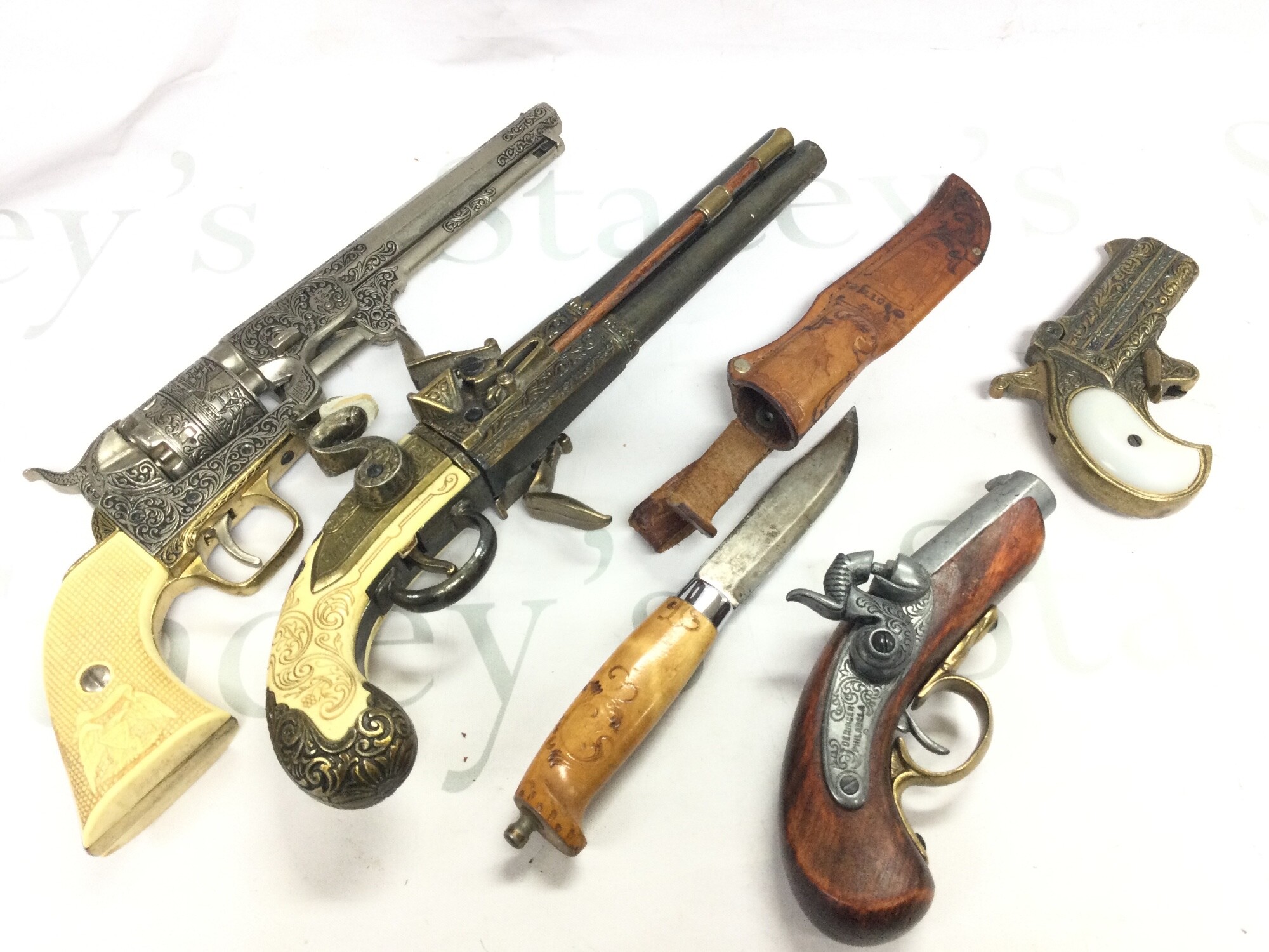 Four replica flint lock and percussion pistols and a hunting knife (5)