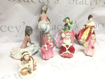 A collection of Lladro and Royal Doulton figures including Autumn Breezes, Southern Belle and coloured Victorian and later drinking classes