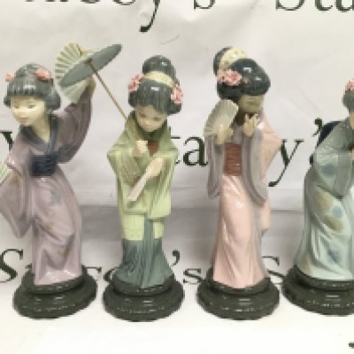 Four Lladro figures of geishas, approx height 29cm.