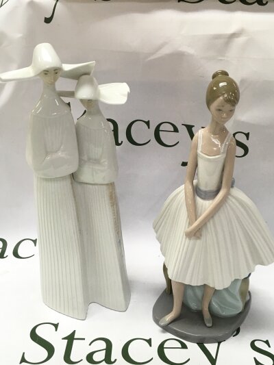 A Nao and Lladro porcelain figure. Tallest 33cm .