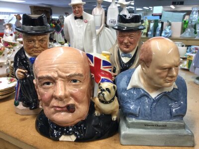 A collection of Winston Churchill ceramics including Royal Doulton.
