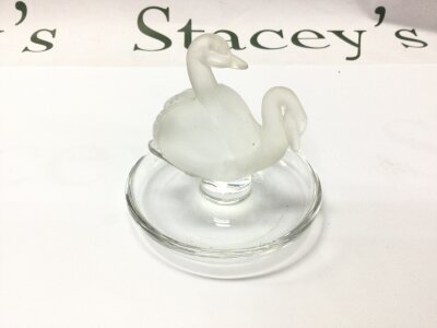 Lalique Deux cygnets clear and frosted ring dish signed Lalique France on the base. Approximately 10cm tall