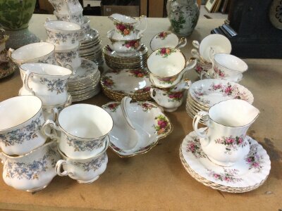 A collection of part tea sets including royal Albert old country rose and lavender rose as well as a paragon part set.