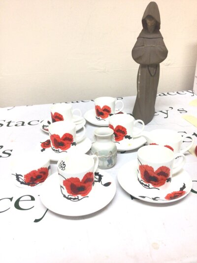 A collection of ceramics comprising Wedgwood Susie Cooper coffee set a Lladro figure of a monk and a small Lladro vase.