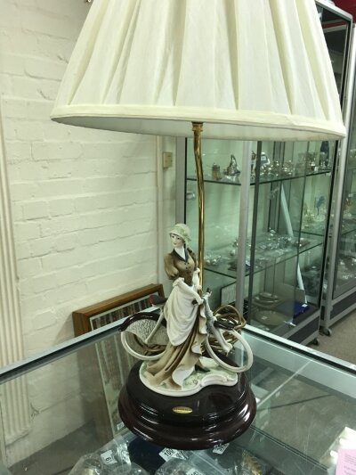 A Newport Florence Gluseppe Armani art nouveau style lady on a bicycle bisque figure lamp, 65cm tall