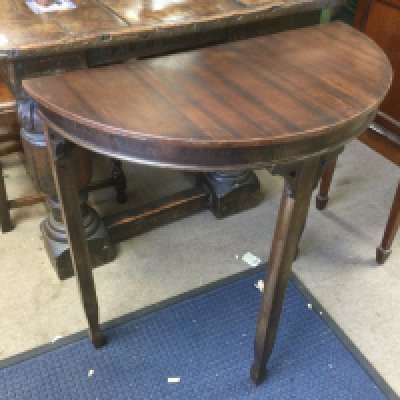 A small mahogany demi lune hall table.- NO RESERVE