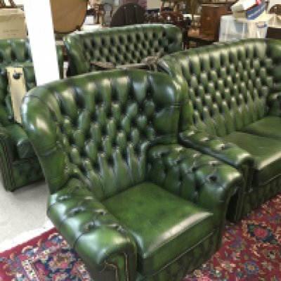 A five piece green button back Chesterfield suite. Shipping category D.
