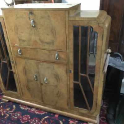 An Art Deco cocktail cabinet, approx 135cm x 44cm x 127cm.
