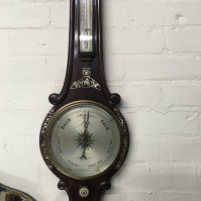 A rose wood barometer inlaid with mother of Pearl .- NO RESERVE