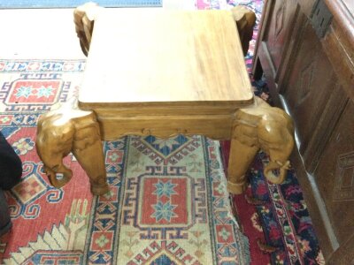 A low elephant table.
Approximately 44cm tall and 70cm wide.