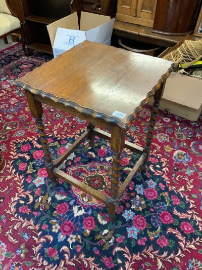 A small oak occasional table.