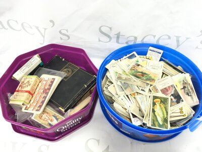 A collection of cigarette cards including Players