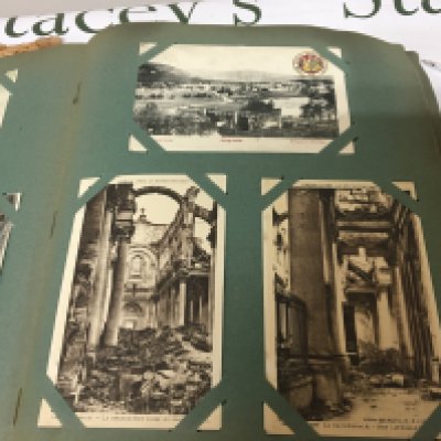 An early 20th century postcard album containing a very good and comprehensive collection of postcards including French I world war cards many other world cards New York some shipping cards including a Edwardian White Star line card British landmarks Towns and Indian cards and more.  NO RESERVE
