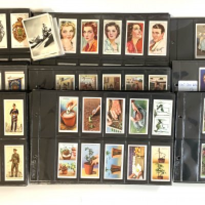 A large collection of cigarette cards, including Wills/Players etc.