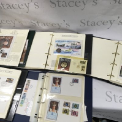 A Collection of assorted first day covers and coins.