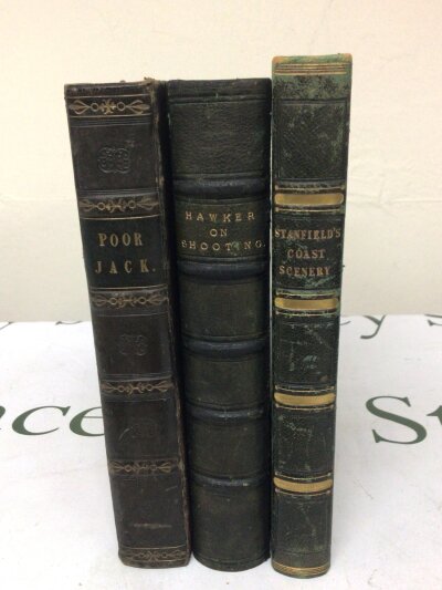 1844 A book half leather bound Guns and Shooting by Lt Col P Hawker 9th Edition Stanfields Coast Scenery with illustrations 1836 and half leather bound book Poor Jack by Captain Marryat with illustrations by Clarkson Stanfield RA 1840. (3)