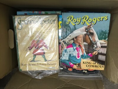 A collection of vintage children’s annuals including Beano, Dandy, Stuwwelpeter etc