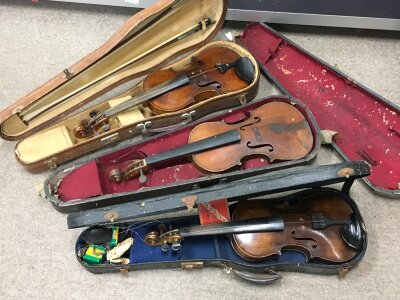 Three violins , one half size with makers Stamp Stradivarius Copy