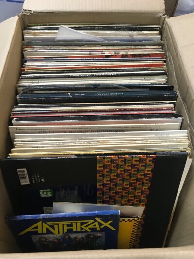 two boxes of Vinyl Records including albums by Meat Loaf, The Beatles, Alice Cooper