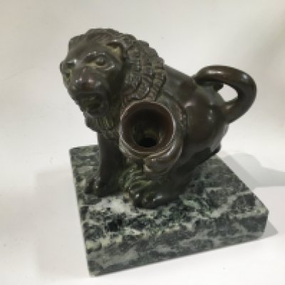 A Victorian style bronze lion figure pen holder.- NO RESERVE