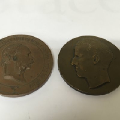 An Austrian Vienna 1873 International Exhibition bronze medal with profile of Emperor Franz Joseph. With one other Belgium bronze medallion (2)- no reserve