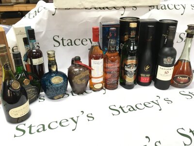 A collection of spirits including whiskeys, Port etc. Grand Armagnac VSOP, Warres Otima 10, Royal salute scotch whiskey, Domaine Tariquet, Talisker, Glenfiddich scotch, Remy Martin VSOP, Taylor 10 year old tawny, Otard VSOP