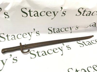 A French Model 1866 (M1866) sword bayonet dated 1871, with scabbard with matching serial number .70cm long