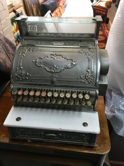 A vintage cash register.
