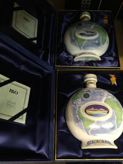 Two boxed limited edition bottles of XO cognac plus two pairs of boxed P&O tumblers and a three alcohol miniatures (5).