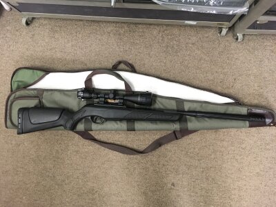 A Gamo air gun and case.