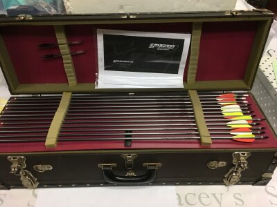 A good quality cased SF Archery Co set comprising carbon arrows and various accessories.