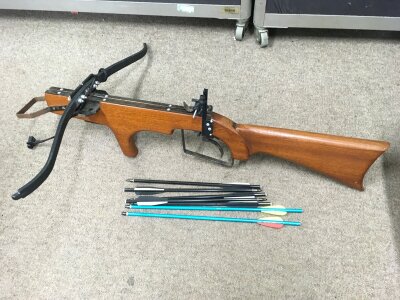 A modern Crossbow and arrows.