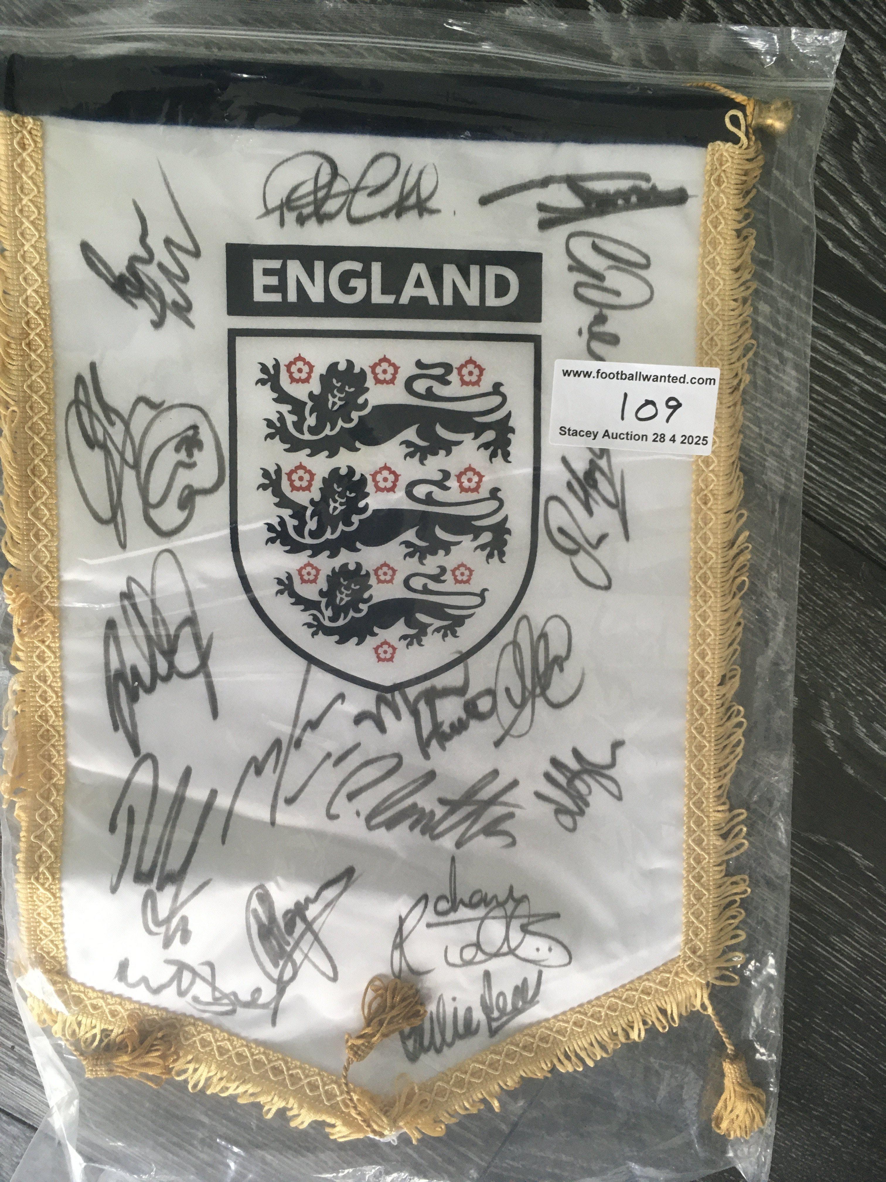 England U21 Signed Football Pennant: Official England pennant signed by 16 players brought back by Peter Barnes the Tottenham + West Ham club secretary who travelled with the touring party. (year unknown).