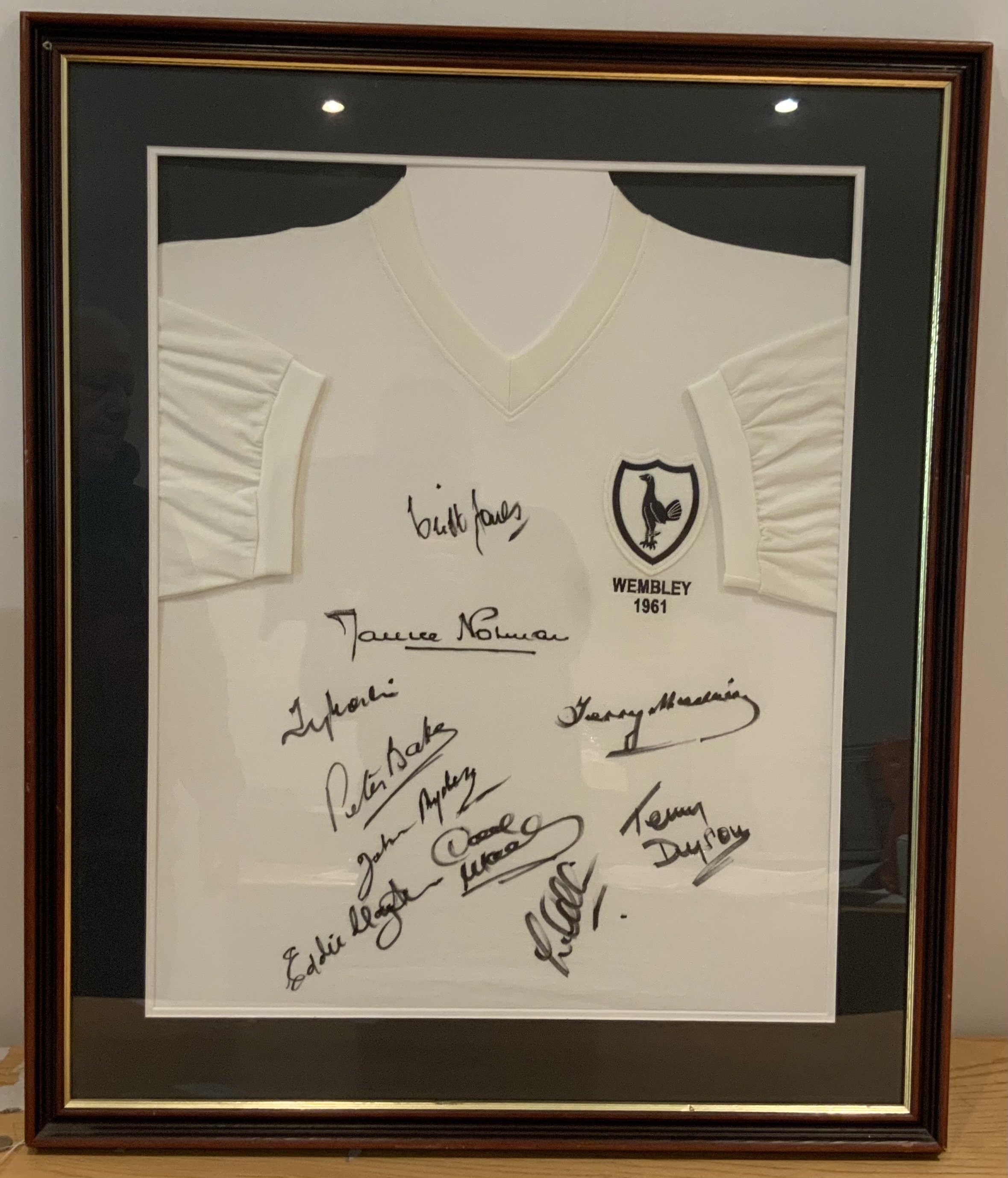 1961 Tottenham Signed Framed Football Shirt: Replica shirt with Wembley 1961 to breast nicely framed with 10 signatures. Includes Norman Dyson Medwin Baker Mackay Clayton Ryden Allen Marchi and Jones. Not for posting unless removed from frame.
