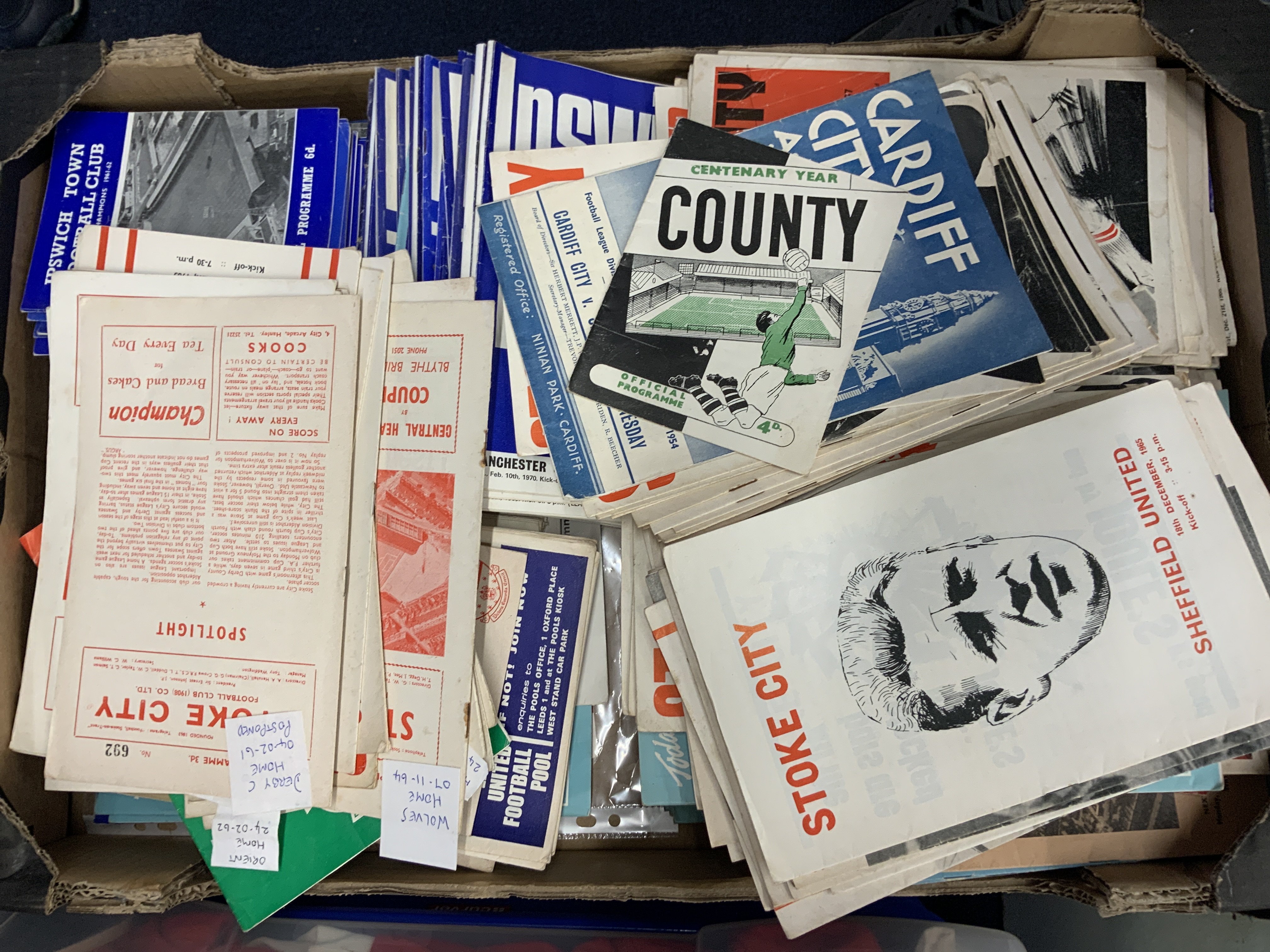 1960s + 1970s Football Programmes: Wide range of clubs to include Ipswich Manchester United Stoke and Leeds. Large quantity in good condition. (2 boxes)