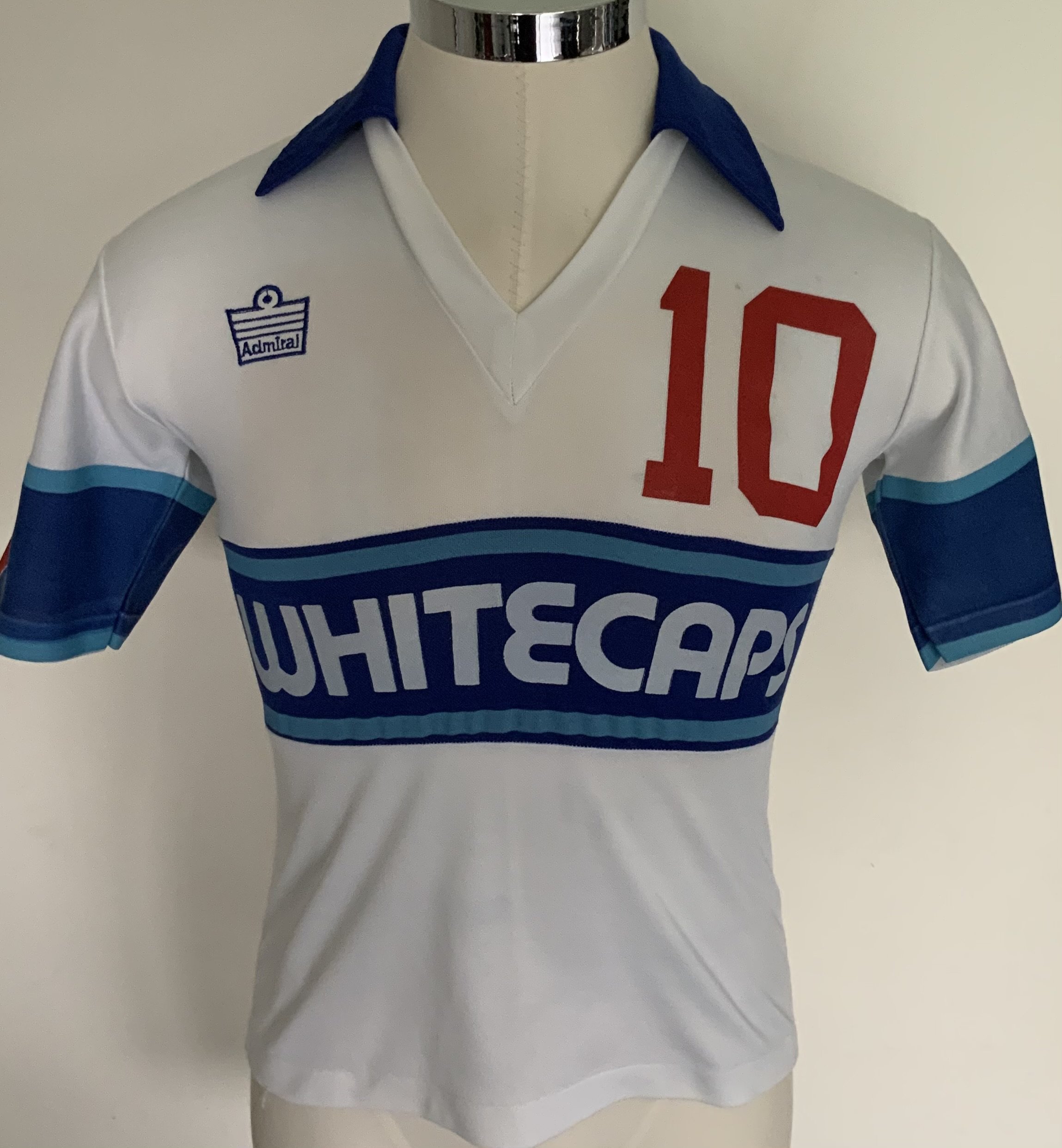 Vancouver Whitecaps 1980 Match Worn Football Shirt: Excellent condition very rare home shirt made by Admiral. Number 10 to front, rear and sleeves. Both sleeves have the Canadian flag. Size 36 attractive shirt has Taylor to rear. The NASL dissolved in 1984 with many participating teams going the same way. COA from Alan Taylor who wore number 10 in his first season.
