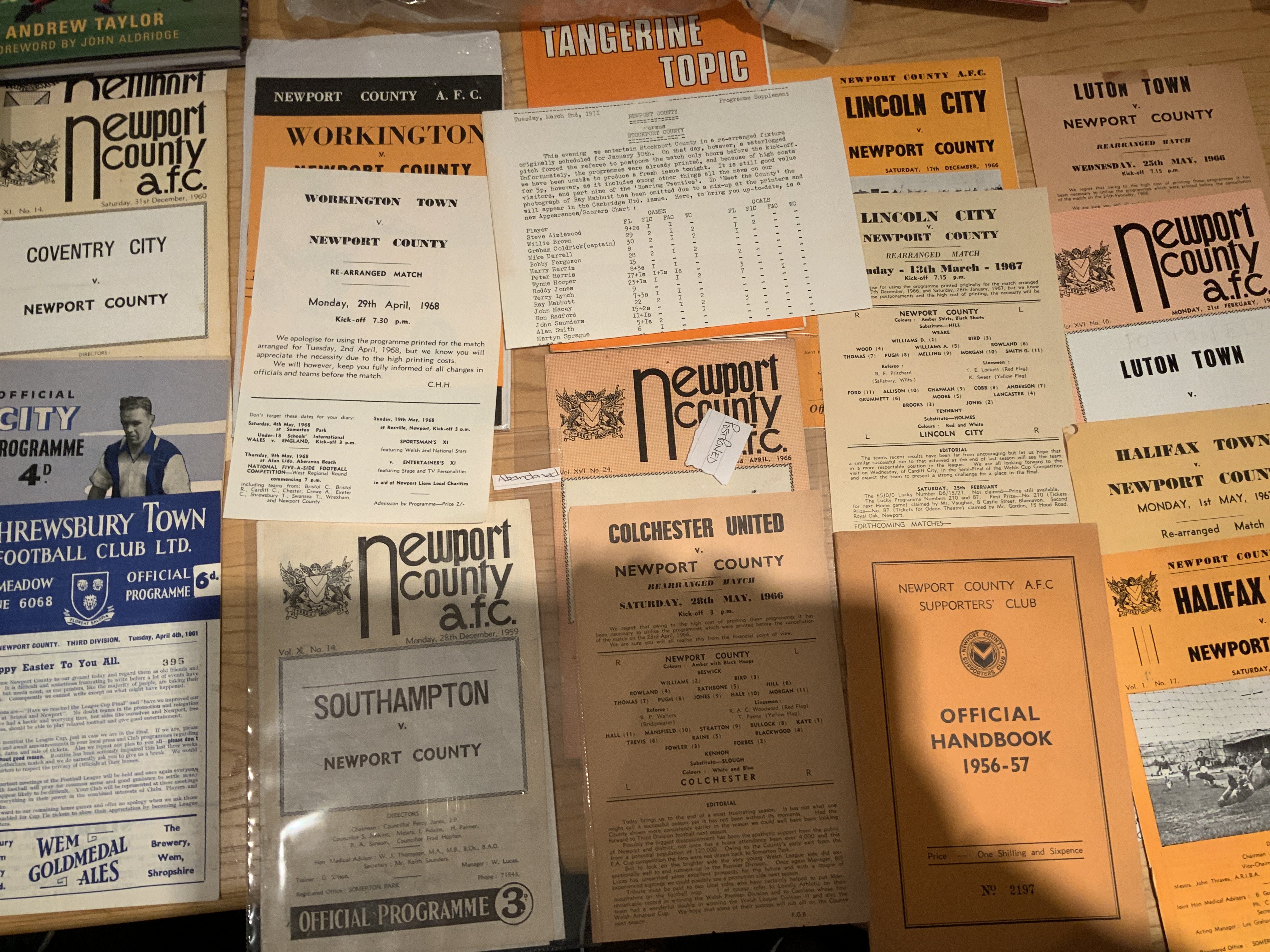 Newport County Postponed Home Football Programmes: Issues to include first programme and single sheet rearranged programme are 65/66 Luton, Colchester 66/67 Lincoln, Halifax, 67/68 Workington, 71/72 Stockport. Other postponed or abandoned include 59/60 Southampton, 60/61 Coventry, Port Vale, Watford, 65/66 Chester. Aways include 56/57 Plymouth + Coventry both December, 60/61 Shrewsbury and many more. C/W 5 books including Amber in the blood and 56/57 handbook. Nice lot.