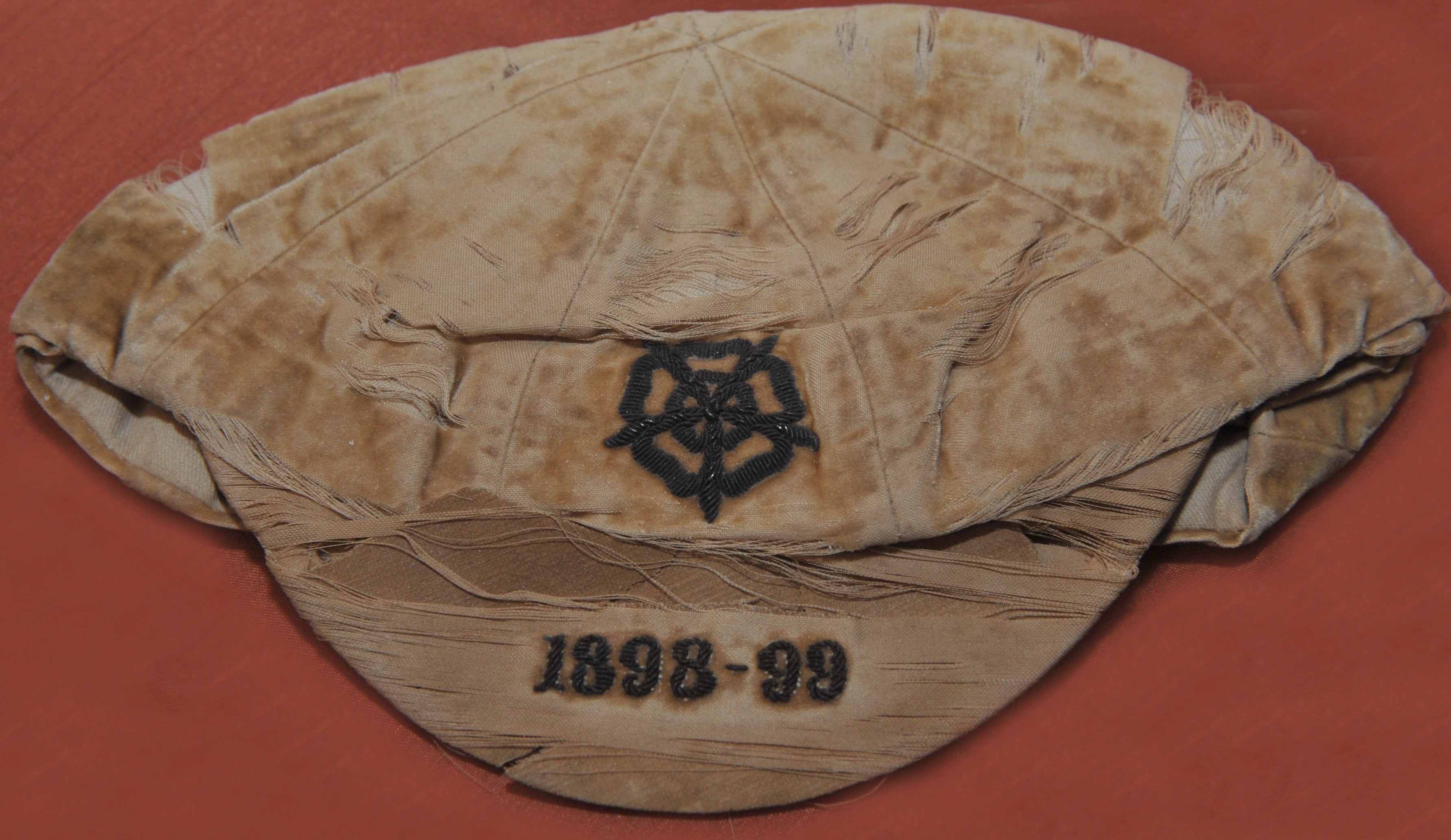 Billy Williams West Brom 1898 - 1899 England Football Cap: Full International match which ended England 13 Ireland 2 played at Roker Park Sunderland which was Billys 5th full cap. Heavy wear and discolouration to cap that was made by Foster + Co. Peak is embroidered 1898-99.